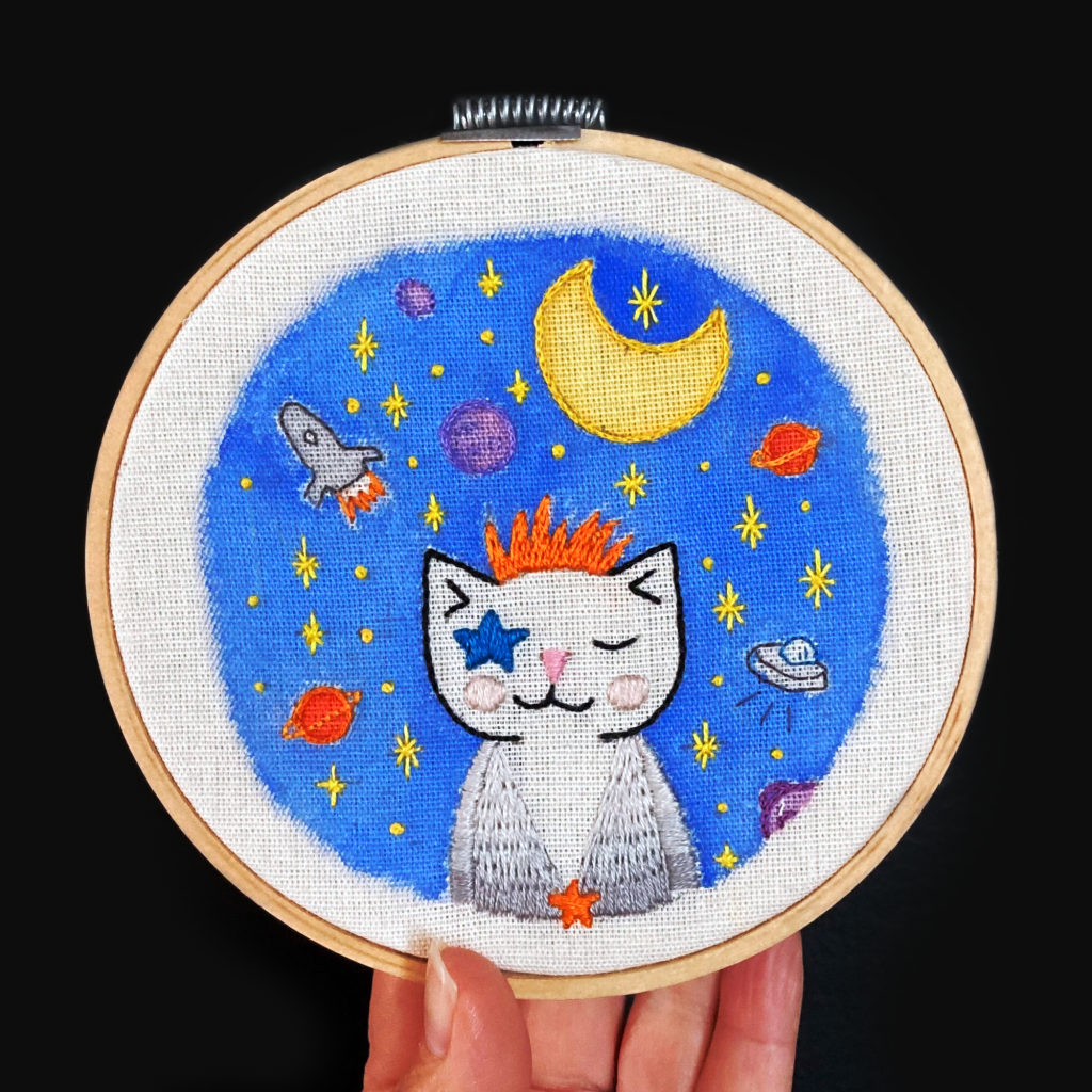 StarKat Embroidery on Black Background